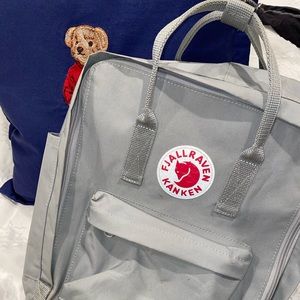 Fjallraven Kanken backpack in light grey.